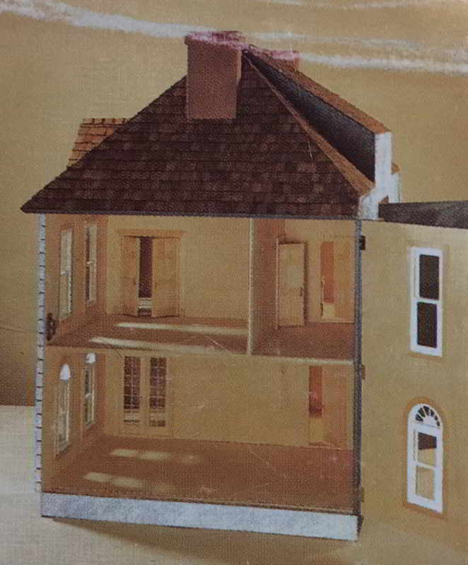 View of dollhouse with opened right side panel