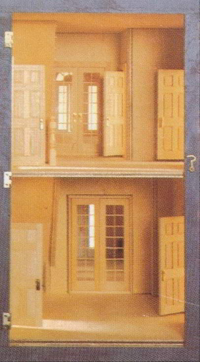Close view of interior of dollhouse through opened panel