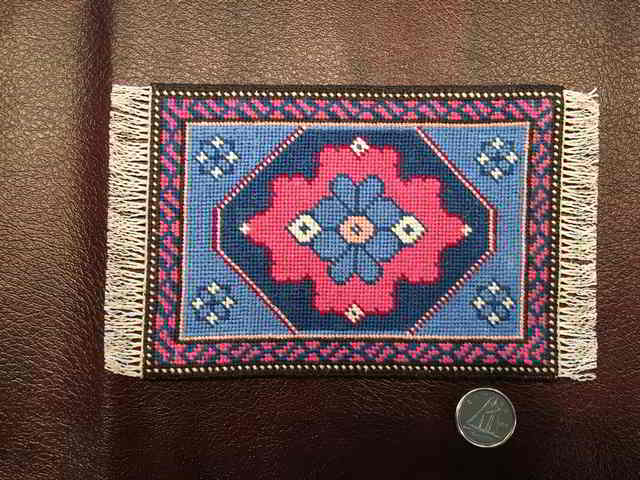 miniature floral pattern rug, needlepoint, many stitches