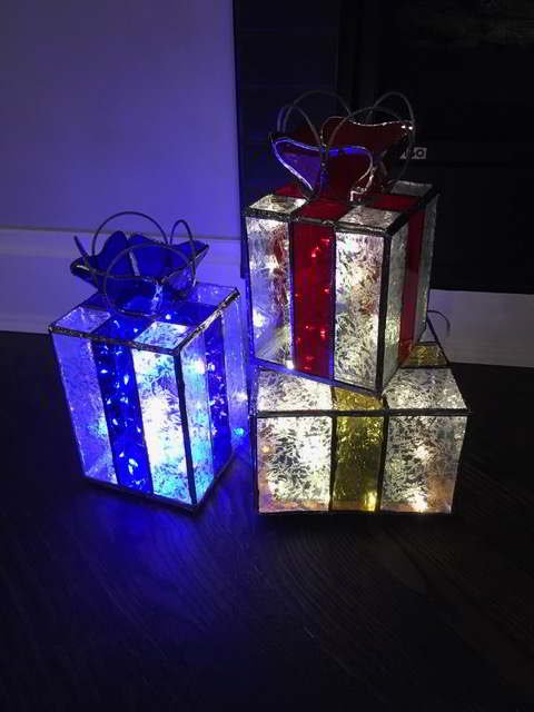 the 3 boxes Larry made for Taffy with lights on