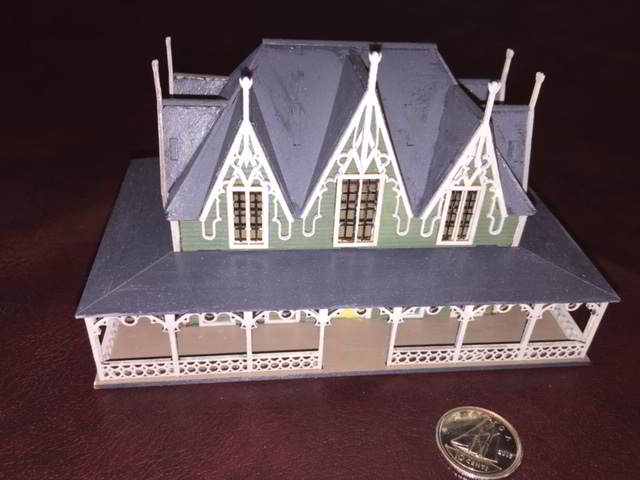 front of the 1 to 144 scale dollhouse